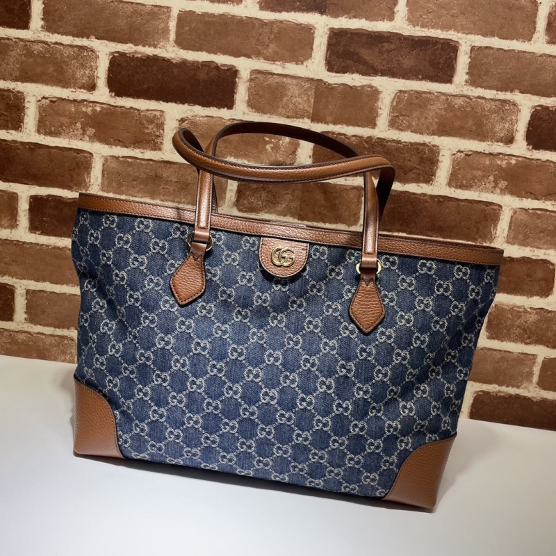 G*u*i shopping bags